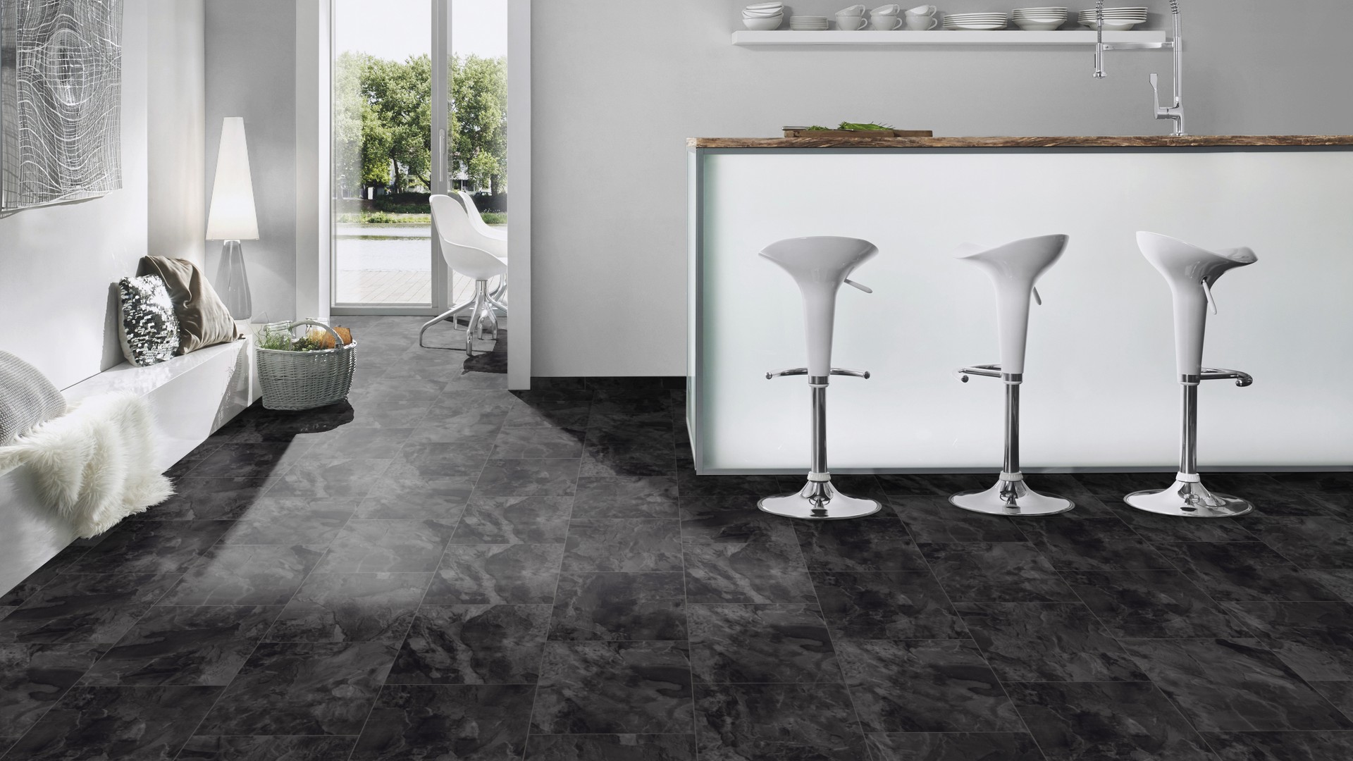 K389 Nightfall Slate flooring in a modern kitchen – practical and elegant stone-look laminate for moisture-prone areas