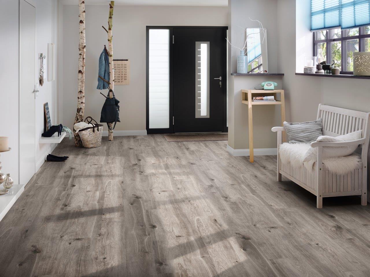 K395 Tornado Oak laminate flooring in a child's room – rich oak tones bringing natural warmth into the space