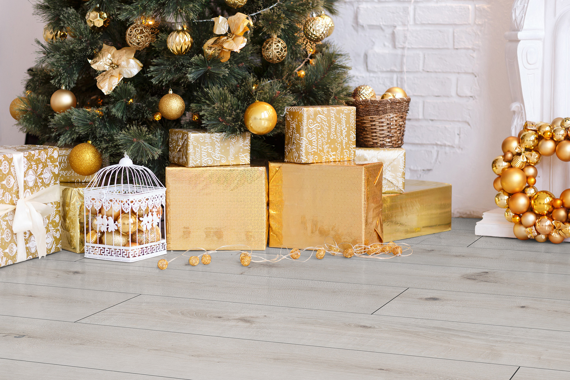 Close-up of Rocko Wide SPC flooring White Poppy R129 with festive Christmas decorations.