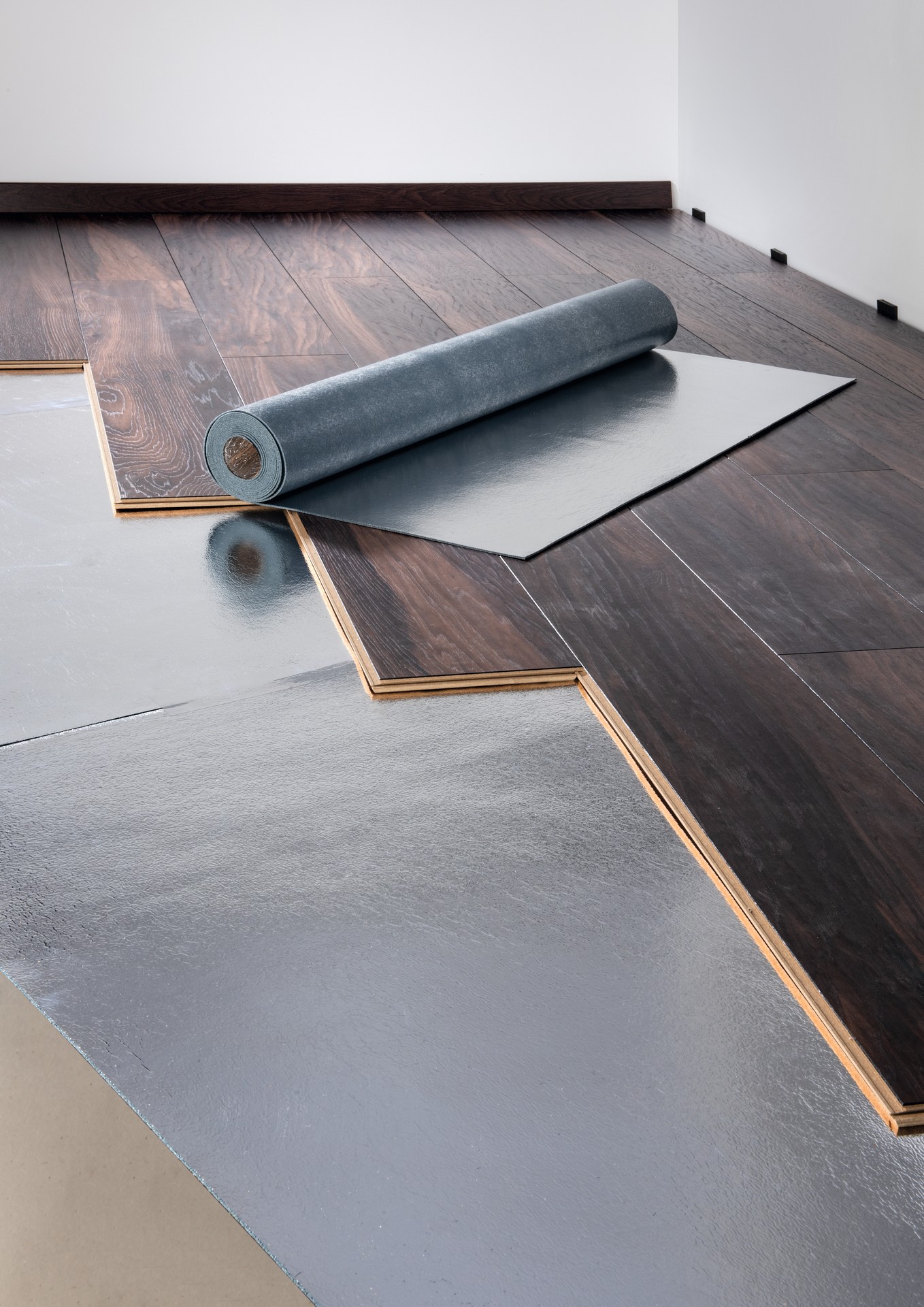 Polyurethane laminate underlay with moisture protection