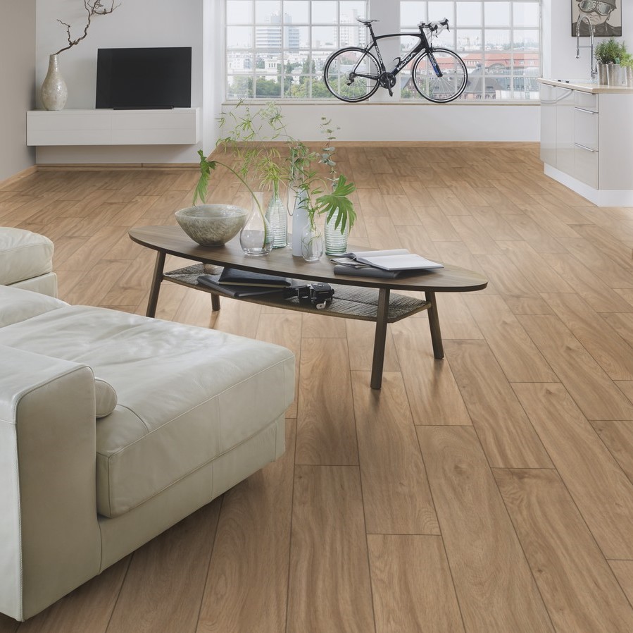 Visual of Credenza Oak Laminate Flooring K338, emphasizing its realistic wood grain detail.