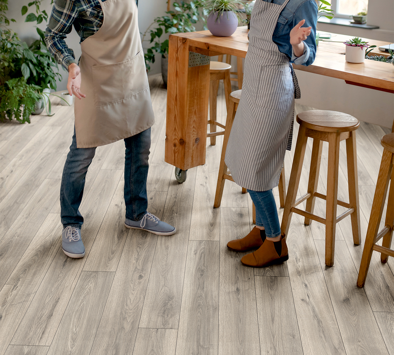 K451 Silverdale Oak flooring with couple potting plants – water-resistant surface perfect for real life moments