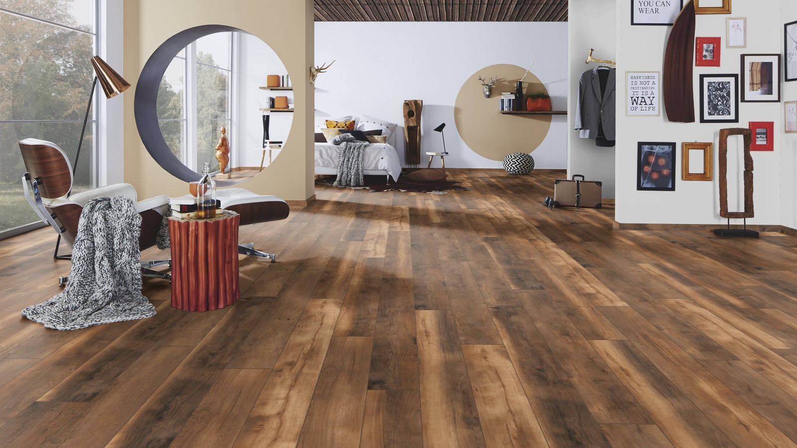 Extravagant bedroom featuring K412 Doubloon Oak laminate flooring -  with microscratch protection and an antibacterial coating.