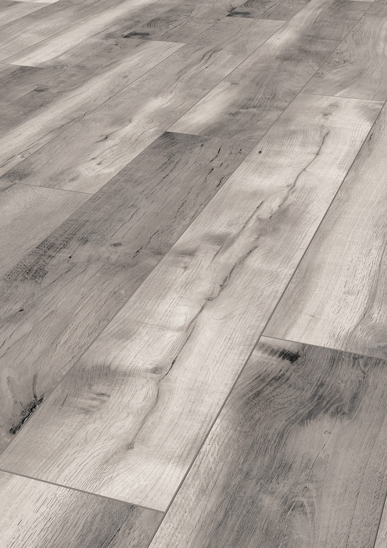 Laminate flooring  in light and dark grey shades. The K413 Blackwater Oak features an innovative design that brings an urban feel.