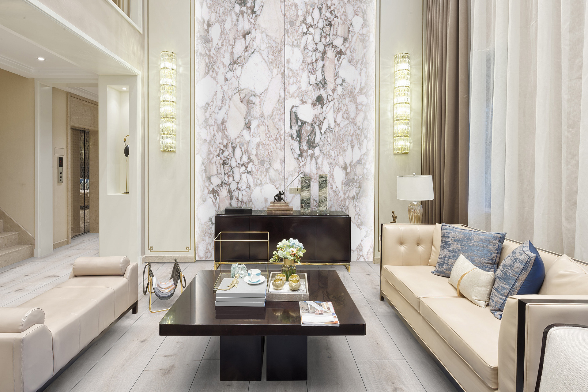 Bright living room with Rocko Wide SPC flooring White Poppy R129, natural light, and light-colored furniture