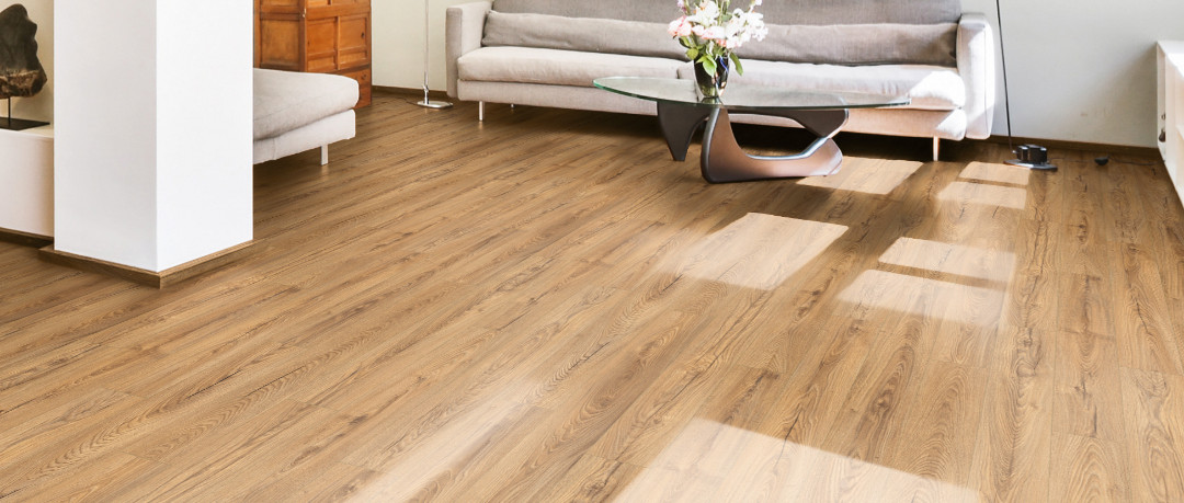 Image of a bright and inviting modern living room featuring light brown laminate flooring