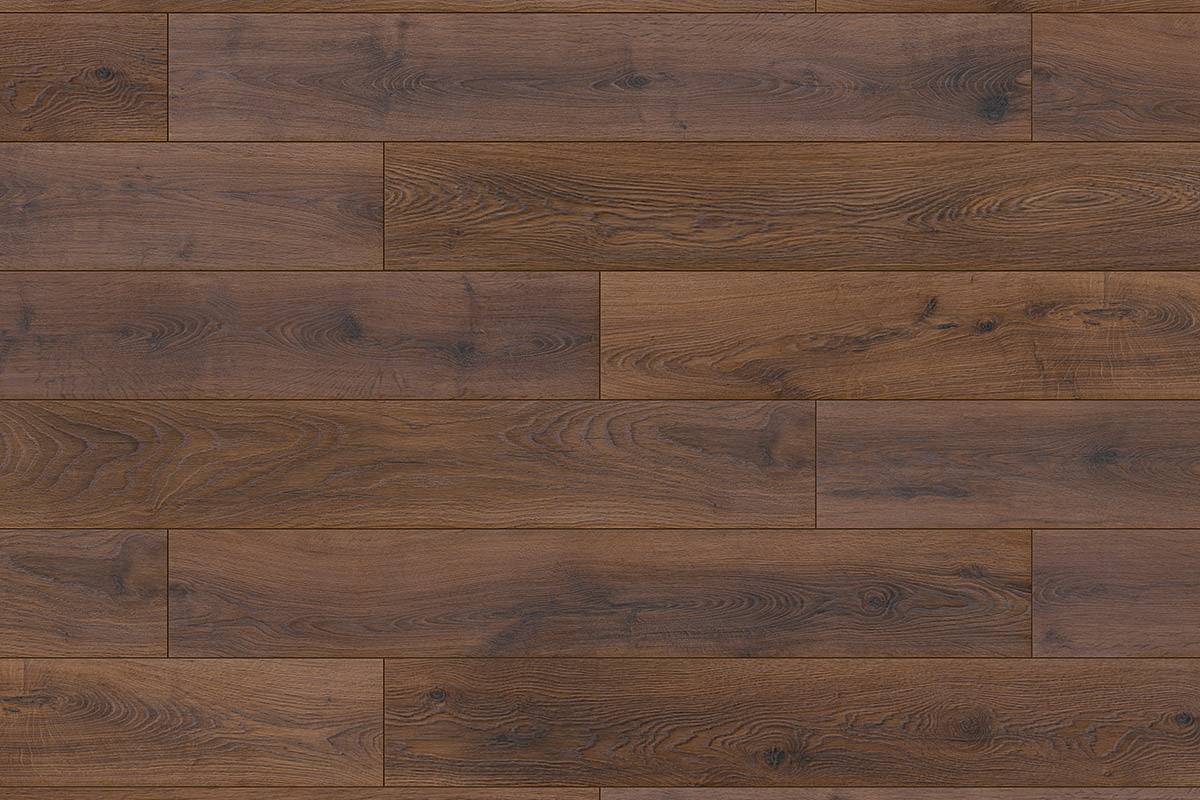 "Close-up of K489 Bourbon Hills Oak MO.RE! sample, featuring deep brown tones and intricate grain patterns.