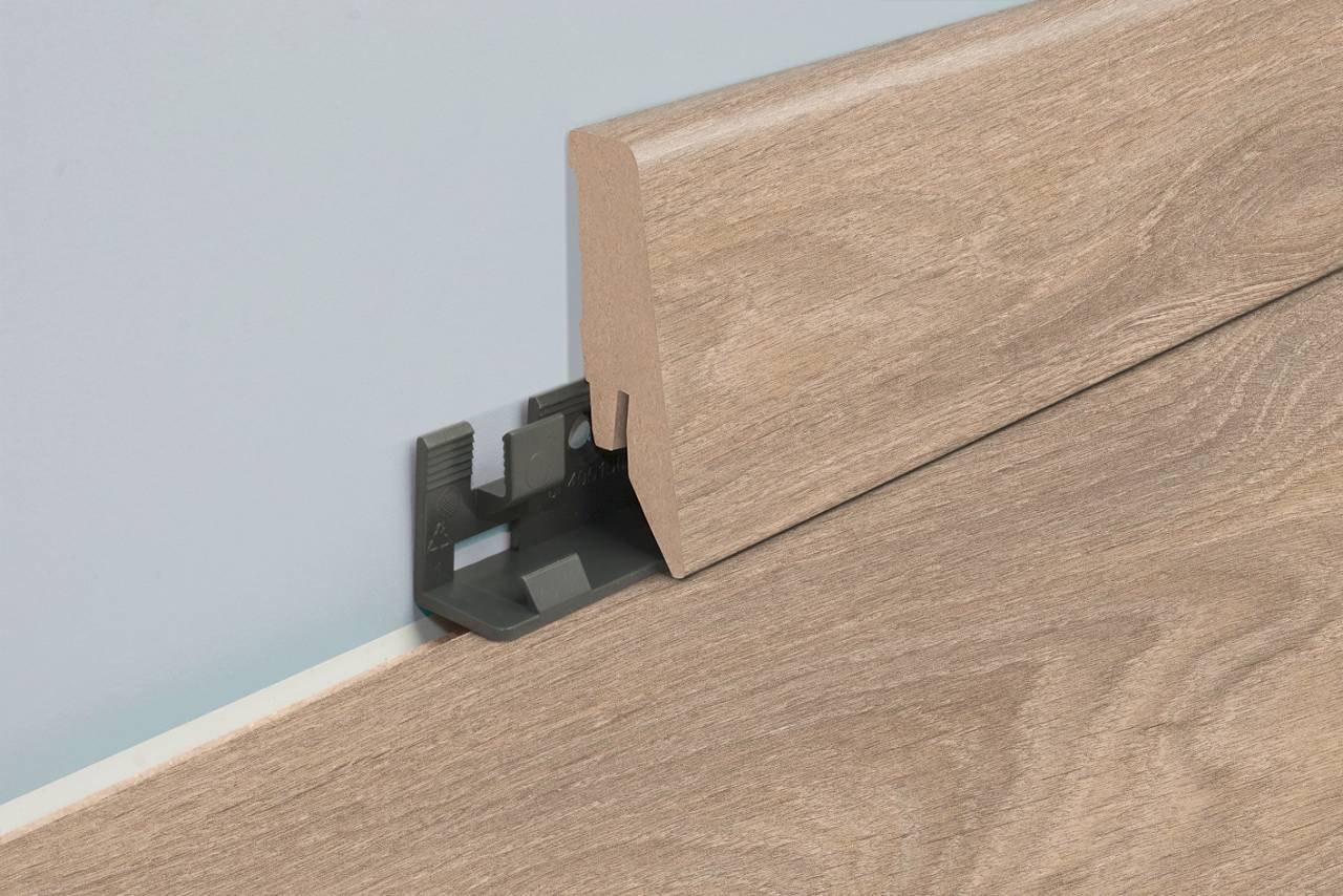 MDF wood floor sill 8575 with cable channel, height 58 mm. Suitable for beige-grey laminate flooring.