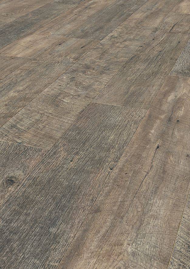 Close-up showing the rich textures and rustic appeal of the K061 Rusty Barnwood laminate flooring.