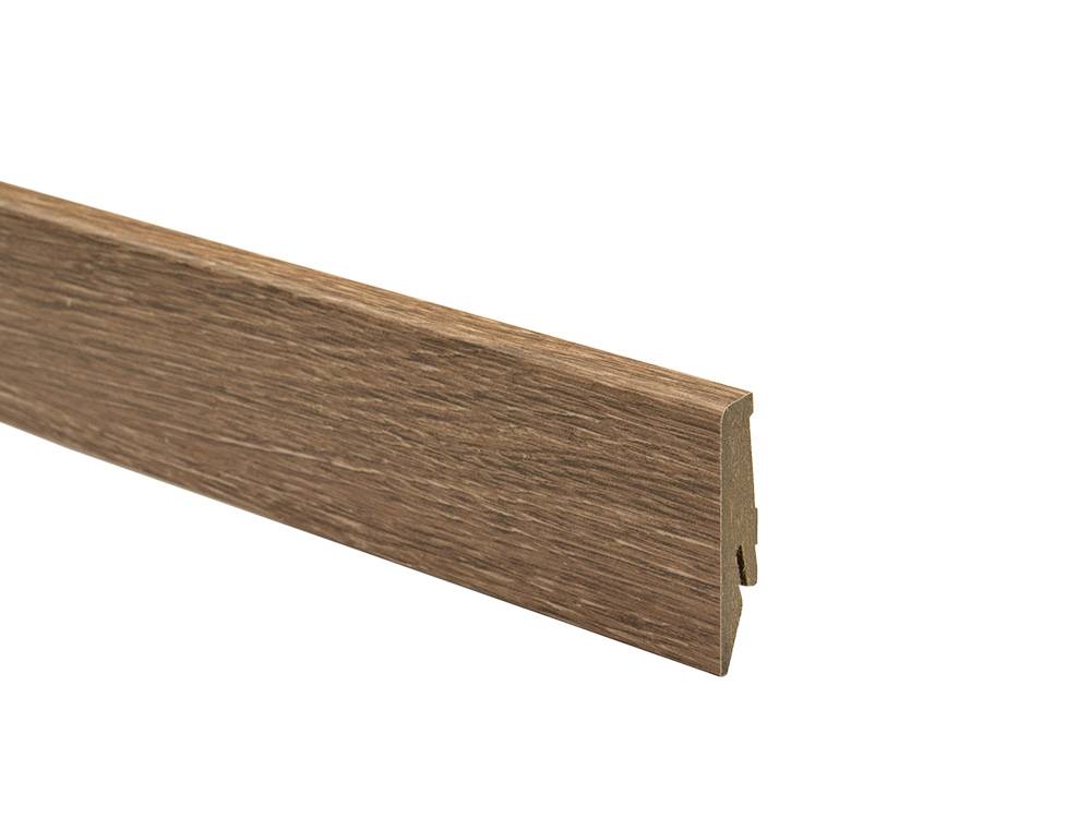 Close-up of 8634 MDF skirting board K58C-Orca showing the textured surface and rich colour.